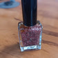 Compact 10 ML Metallic Rose Glitter Nail Paint bottle, ideal for travel