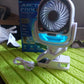 The versatile travel fan attached to a bicycle handlebar for on-the-go cooling.