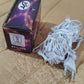 Festive multi-color LED string lights illuminating garden area