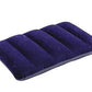 Ergonomic design of the comfortable blue velvet travel pillow providing neck support.