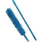 The soft microfiber head of the fan duster attracting dust from a surface.