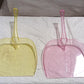Space-saving unbreakable plastic dustpan suitable for various surfaces