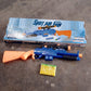 Shot air gun toy packaging box showing toy and foam bullets