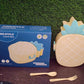 Colorful retail packaging box for the pineapple kids bento lunch box, showcasing its features.