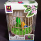 Packaging for the Spark Tots sound-activated chirping bird toy.