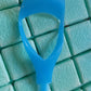 Full view of the 3-in-1 plastic Eyelash Tool, showcasing all its features.