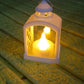 Arrangement of multiple flameless LED lanterns for a festive ambiance.