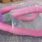 Angled view of the Thigh Toner, clearly showing its sturdy inner spring mechanism.