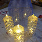 Transparent acrylic LED rose candle with a warm glow, suitable for Diwali and Christmas.