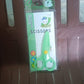 Plastic safety scissors cutting craft paper with rounded safety tips