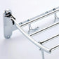 Space-saving folding towel rack in its collapsed position, ideal for small bathrooms.