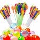 A large bunch of filled, colorful Holi water balloons ready for a splash.