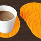 Various round shape silicone cup mats in different colours, showcasing versatility.