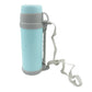 Double-wall insulated bottle with an adjustable shoulder strap for travel.