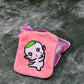 Detailed view of the cute cartoon design on the Pink Hot Water Bag cover.