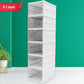 White multi-tier utility cart with hollow design, ideal for bathroom storage solutions.