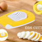 Vibrant yellow Quickslice Egg Cutter, adding a pop of color to your kitchen tools.