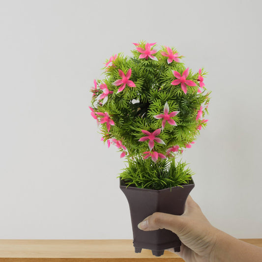 Artificial plant adorning a modern living room shelf, adding a fresh touch.
