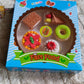 Packaging of the 5-piece 3D fast food erasers set, ready for gifting.