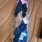 Neutral image showing product packaging with satin bow clips
