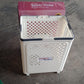 Foldable laundry basket being used to carry laundry with wheels
