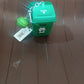 Trash Can Keychain hanging on backpack as a fun and eco-conscious accessory