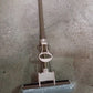 The sponge mop effectively cleaning a tiled floor, demonstrating its dirt removal capabilities.