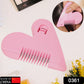 White plastic hair cutting comb with fine and wide teeth.