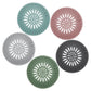 Versatile floor drain cover in white, suitable for various bathroom and toilet settings.