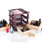 Lifestyle shot of the multi-layered makeup organizer on a dresser.