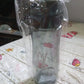 Sports water bottle securely carried in a backpack for travel convenience.