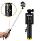 A smartphone connected to the selfie stick via aux wire, ready for instant use.