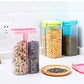 Clear plastic food storage container with two internal compartments.