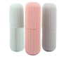 Brightly colored portable toothbrush holder, offering compact and convenient storage.