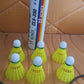Set of six durable plastic shuttlecocks stacked for badminton play