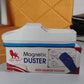 Magnetic board duster being used to clean a whiteboard in a school classroom.