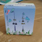 Decorative metal evil eye wind chime displayed as home and garden decor