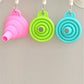 Red silicone funnel with a hanging hole, perfect for easy kitchen storage.