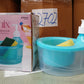 Modern 2-in-1 soap dispenser with sponge holder enhancing a contemporary kitchen.