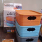Side view of multipurpose plastic storage basket set with handles