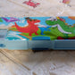 Front view of a plastic kids pencil case with a prominent cartoon print.