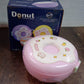 Close-up detail of the durable, BPA-free plastic material of the Donut Lunch Box.