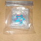 Packaging of metal star hair clips set showing brand details
