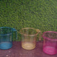 Clear plastic mug, ideal for versatile use.