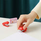 Packaging for the FiloDesk mini stapler set, showing product details.