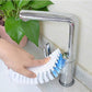 Ergonomic flexible cleaning brush angled to show effective reach for bathroom fixtures.