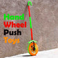 Ergonomic handle and glowing wheel of the engaging push run toy.