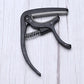 Detail of the Wagtail guitar capo's protective soft pad, preventing instrument damage.