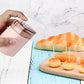 Hand demonstrating the easy automatic dispenser for toothpicks.