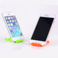 Universal foldable mobile phone stand portable for hands-free device use.